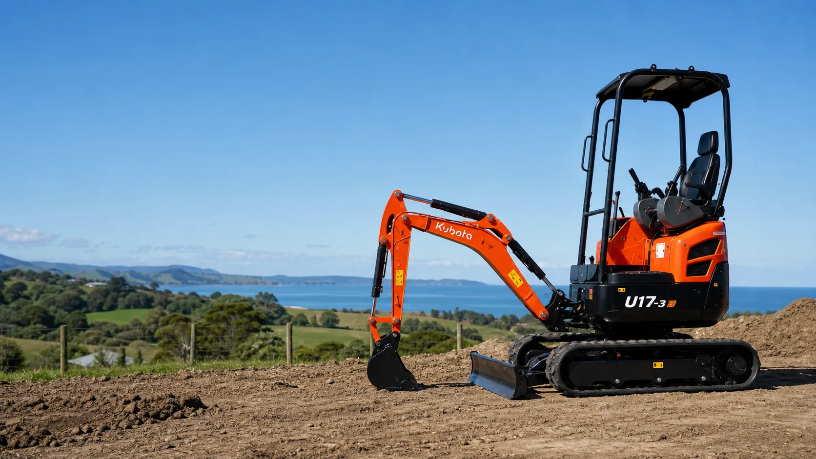 Orange open-canopy Kubota U17-3 mini digger on a Western Bay worksite